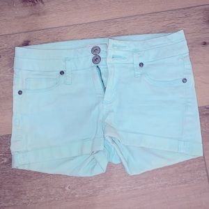 Mint green high waisted jean shorts
